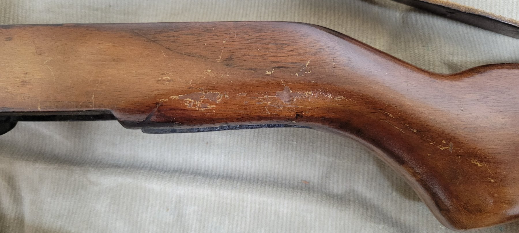 Figure 11 — The left side of the stock behind the receiver, where a Springfield or rebuild cartouche would be. None could be found — just dings, scratches and an old oil finish.