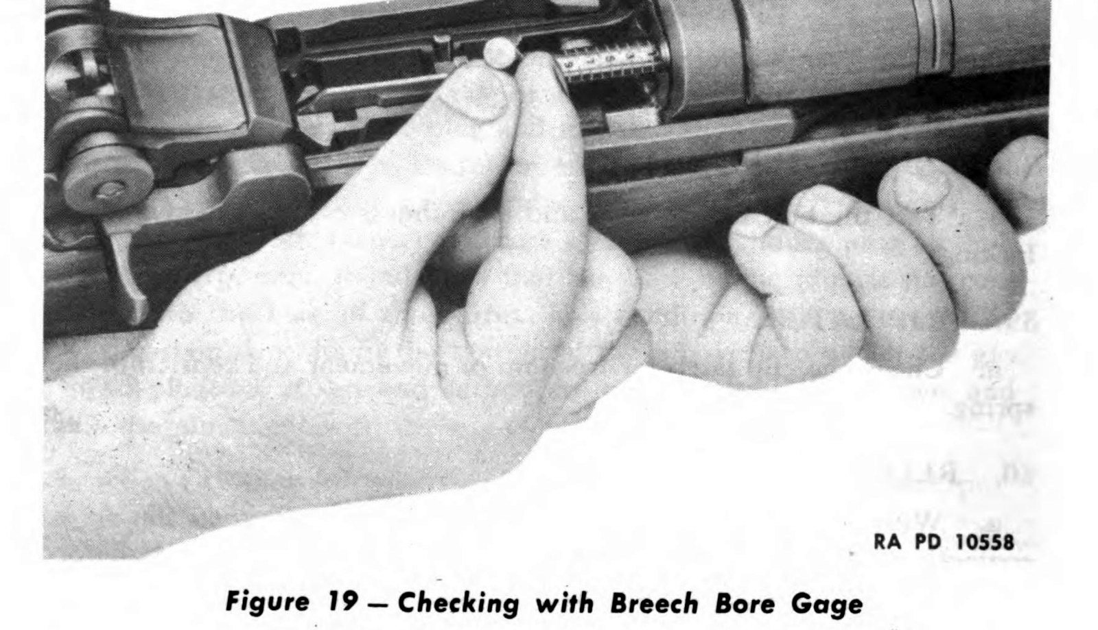Figure 3 — Checking throat wear with the breech bore gage. — U.S. War Department, TM 9-1275 (1942), Figure 19; public domain, via the Internet Archive.