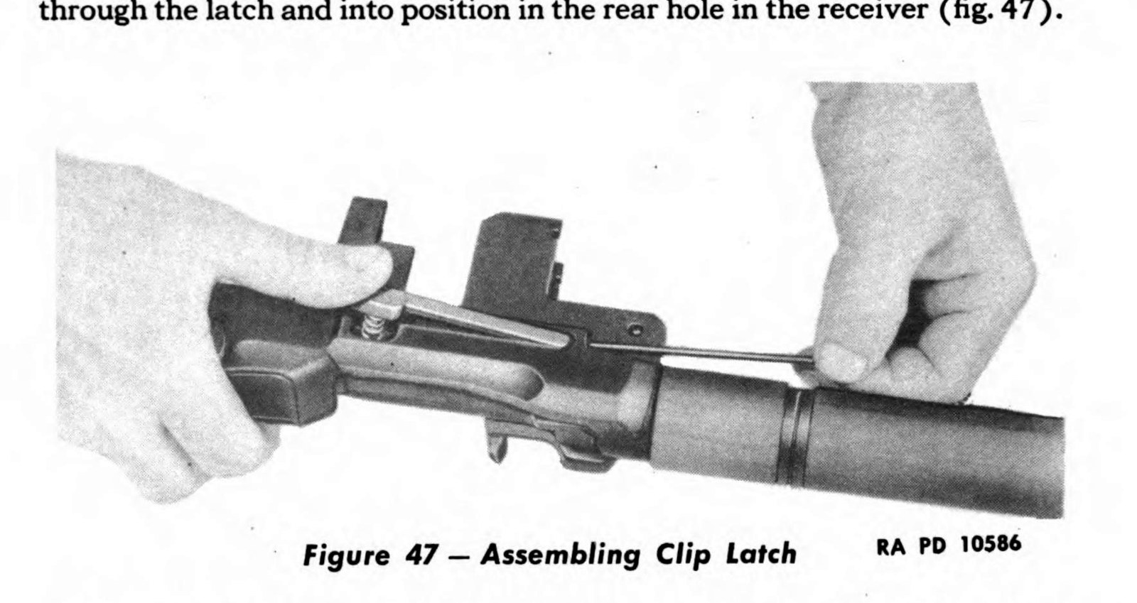Figure 5 — Assembling the clip latch: latch and spring on the left side of the receiver, with the pin driven in from the front while the latch is pressed to relieve the spring. — U.S. War Department, TM 9-127…