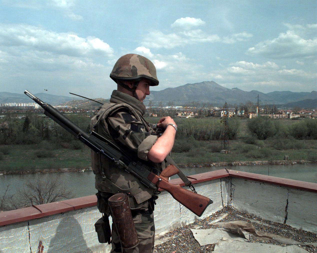 Figure 4 — A French marksman of the Allied Command Europe Rapid Reaction Corps headquarters guard on the roof of the Terme Hotel, Ilidža, near Sarajevo, 26 April 1996. The US Army caption calls his weapon "a …