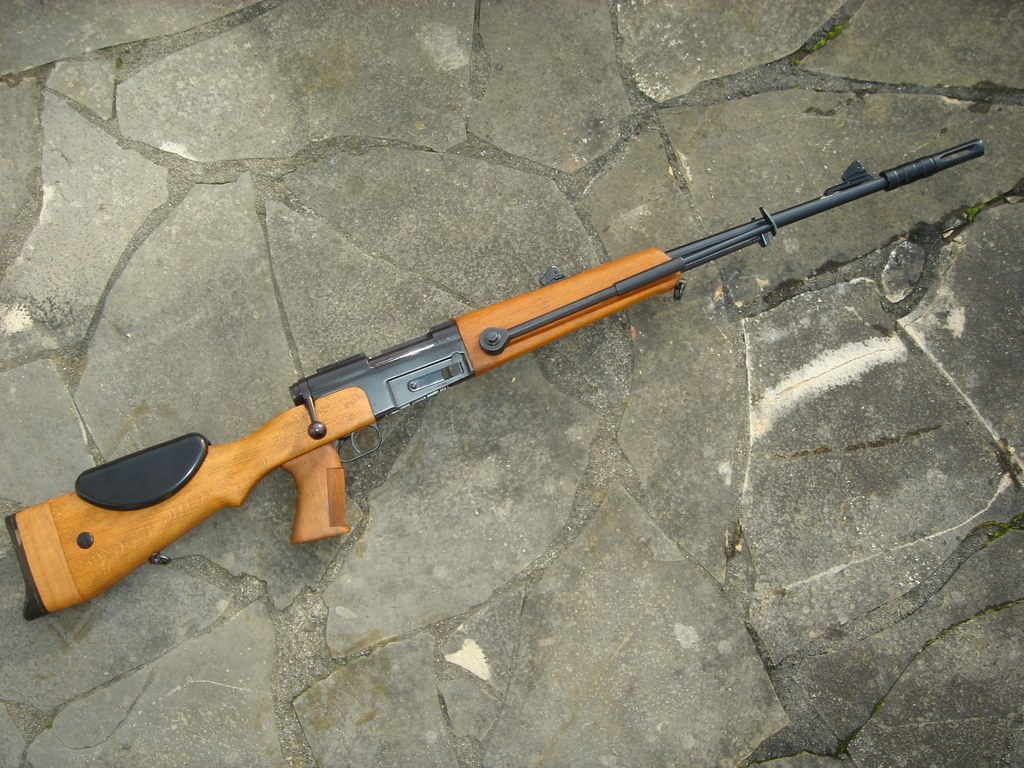 Figure 2 — The FR-F1 from the right with the scope removed, muzzle up and to the right: the receiver and bolt, the detachable magazine, the pistol grip and the stock with its cheek pad and length spacer. Phot…