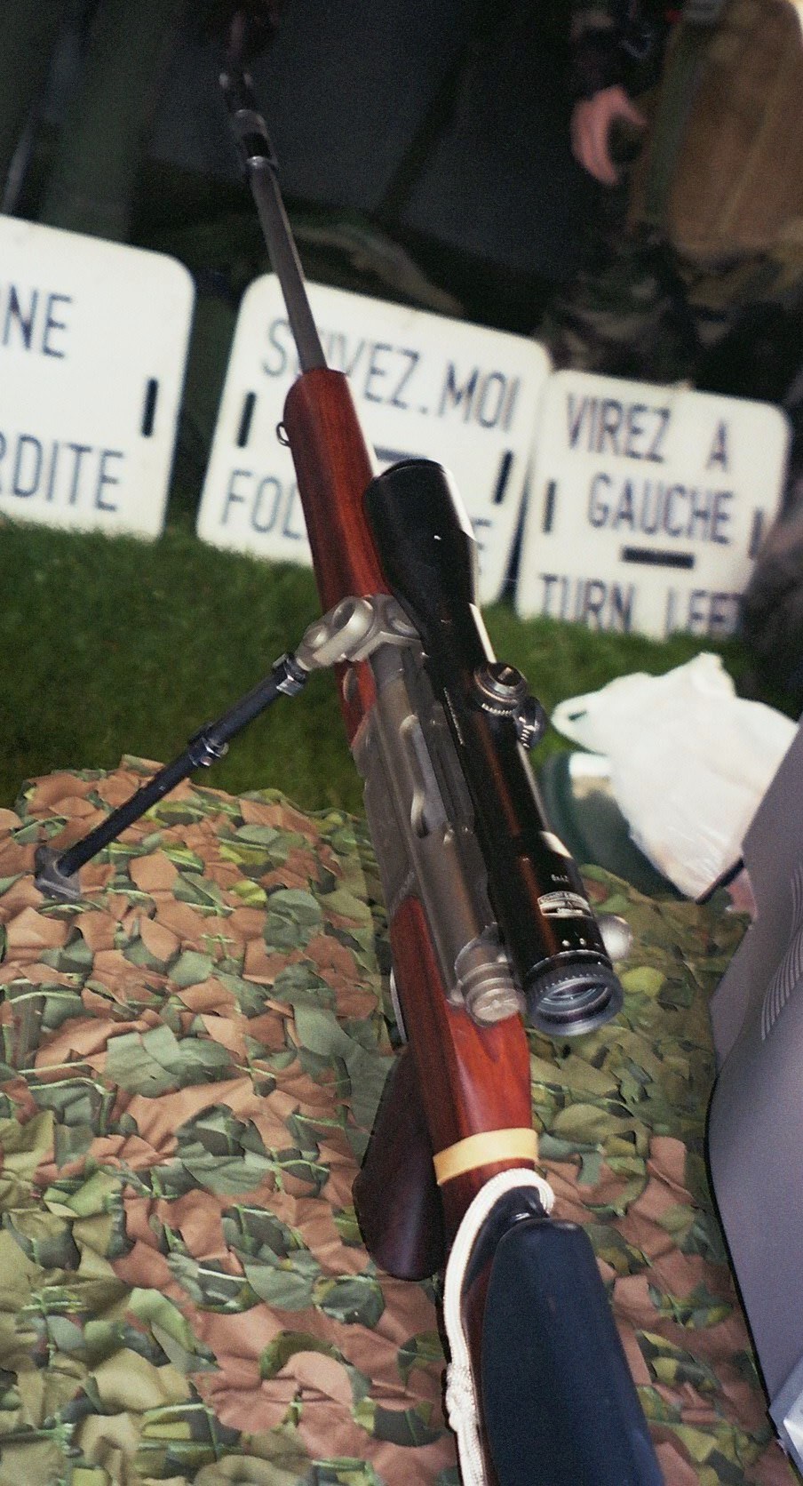 Figure 4 — An FR-F1 at the Nation and Defence days on the Esplanade des Invalides, Paris, September 2005, seen along its length: wooden fore-end, the bipod clamped just ahead of the receiver, and a scope in a…