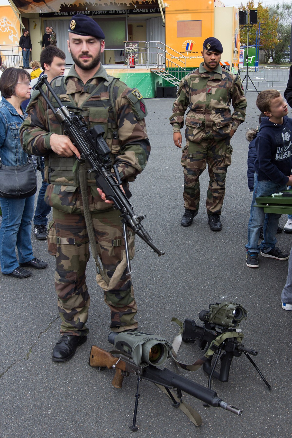 Figure 4 — An FR-F2 laid on its bipod at a public display at Villabé, Essonne, in October 2014, beside a soldier of the 92e régiment d'infanterie in FÉLIN equipment. A thermal weapon sight is mounted in place…