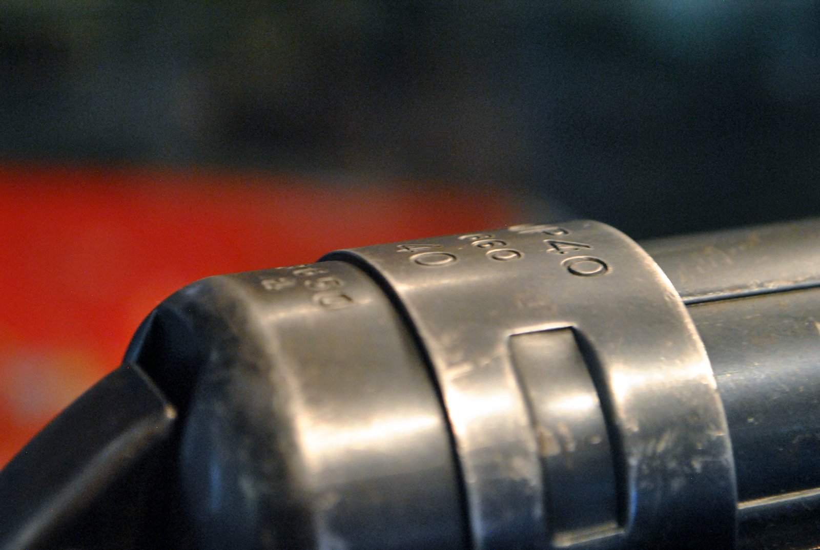 Figure 3 — The junction of receiver, barrel collar and barrel. The receiver ends here; everything forward is barrel. There is no room for, and no evidence of, a bolt that wraps around it.