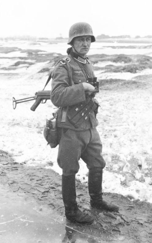 Figure 3 — German infantry in winter. The MP 40 appears in photographs like this constantly — which is a fact about what photographers found interesting, not about establishment strength.