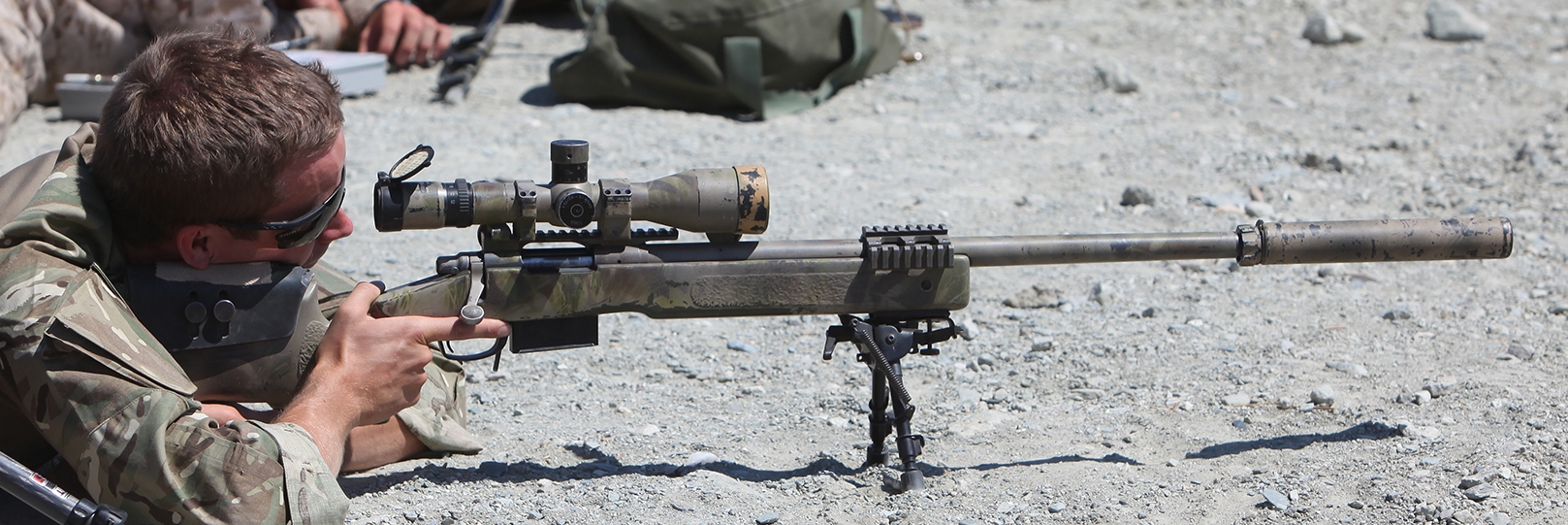 Figure 6 — An M40A5 in profile: McMillan A-4 stock, Badger detachable-magazine bottom metal, rail with the variable day scope, and the threaded muzzle with its brake.