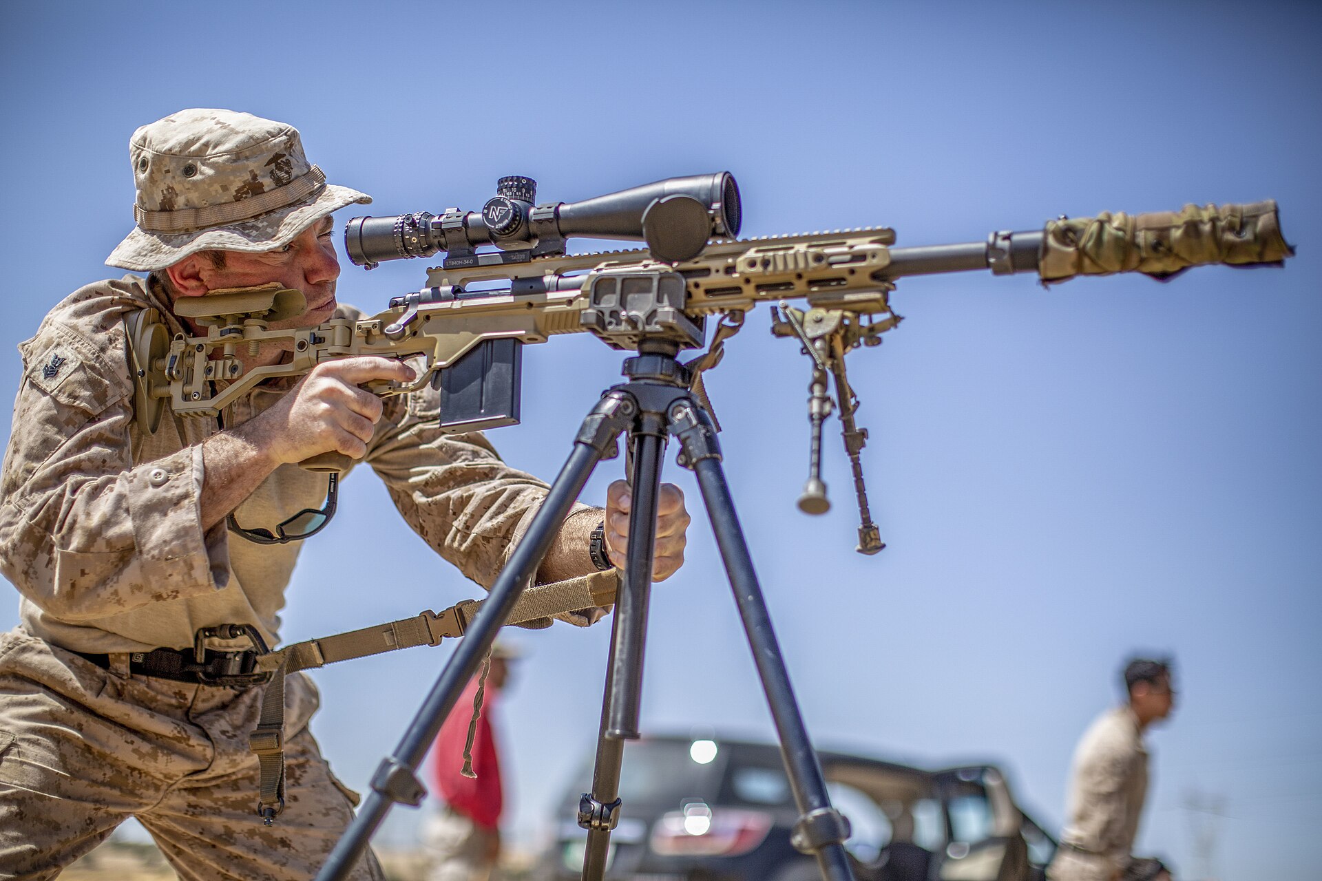 Figure 9 — A sailor with the 11th Marine Expeditionary Unit's Maritime Raid Force sights an M40A6 at the King Abdullah II Special Operations Training Center, Jordan, 26 August 2019. The folding chassis and fu…