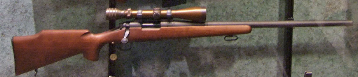 Figure 2 — An M40 displayed at the National Firearms Museum: wooden stock, Model 700 action, and the long Redfield variable scope.