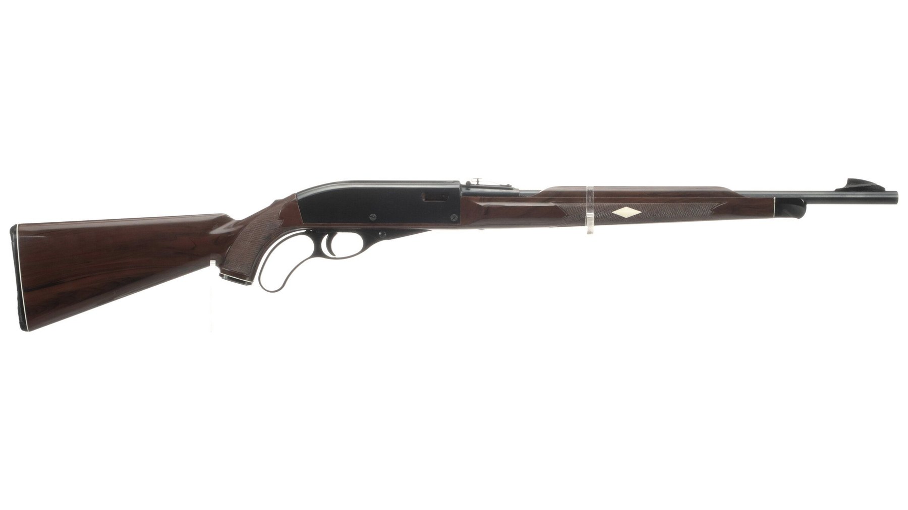 Figure 6 — A Nylon 76 Trailrider in Mohawk Brown, right side. The short lever loop replaces the Nylon 66's trigger guard; the stock, barrel, butt magazine and sights are the autoloader's. Rock Island Auction …