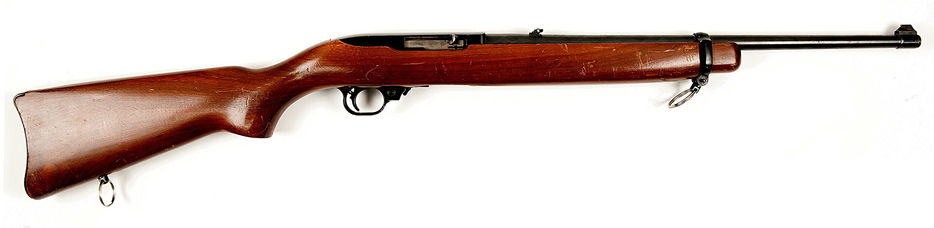 Figure 2 — A 10/22 carbine photographed by the Bureau of Alcohol, Tobacco, Firearms and Explosives: hardwood stock, curved carbine buttplate, barrel band, sling swivel under the band. This is the reference pa…