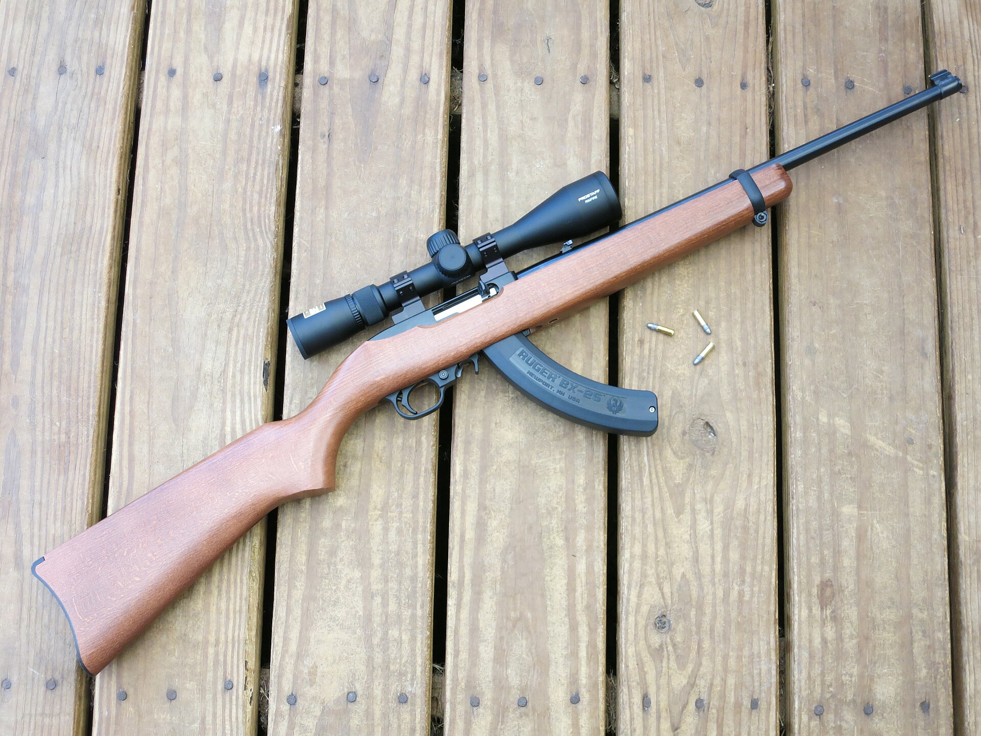 Figure 5 — A current-production 10/22 carbine with a BX-25 magazine and a scope. Ruger introduced the BX-25 in April 2011 — "We designed them. We didn't license and rebrand someone else's magazines," as its C…