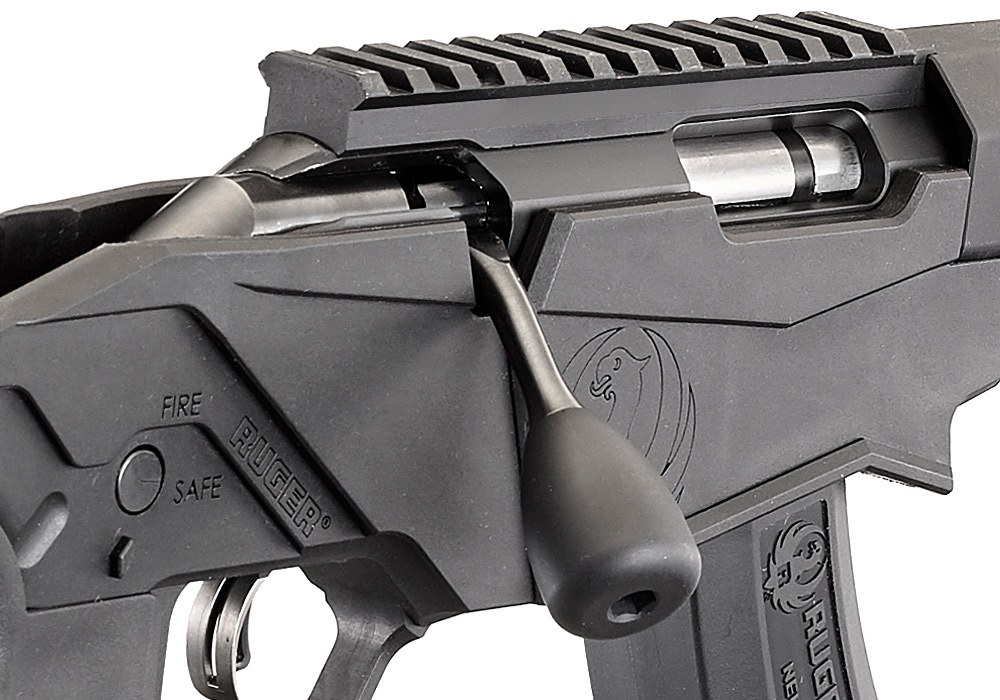 Figure 4 — The Precision Rimfire's bolt knob and action from the right: the oversized knob Ruger shares with the centerfire rifle, and the FIRE and SAFE markings of the reversible selector.