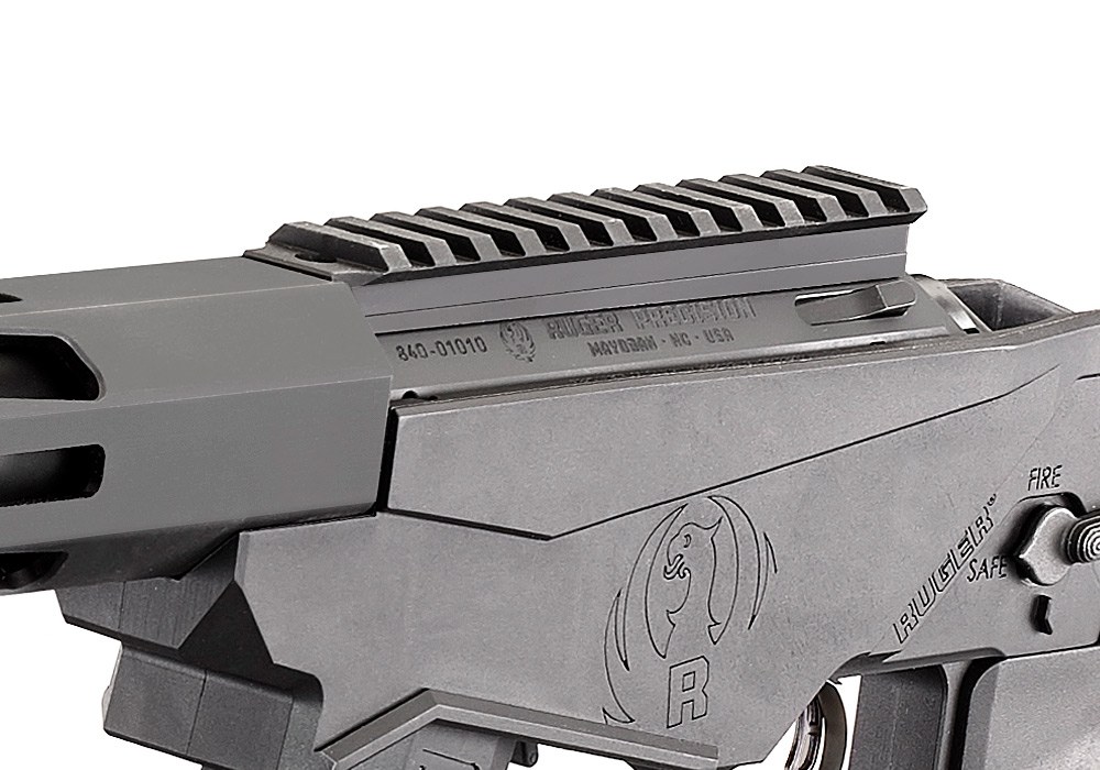 Figure 2 — The rimfire's receiver and 30 MOA scope base, with the maker's and model markings on the receiver side. The base cant is half again the centerfire rifle's.