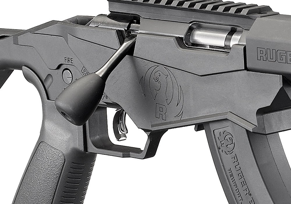 Figure 6 — The Precision Rimfire's Marksman Adjustable trigger with its centre release blade, and the AR-pattern grip and selector.