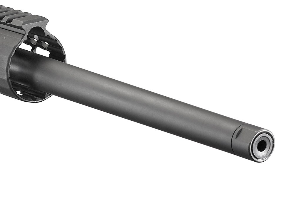 Figure 5 — The launch rifle's muzzle: a plain medium-contour barrel ending in a thread protector over the 5/8-24 thread. From 2016 the .308 shipped with a brake here instead.