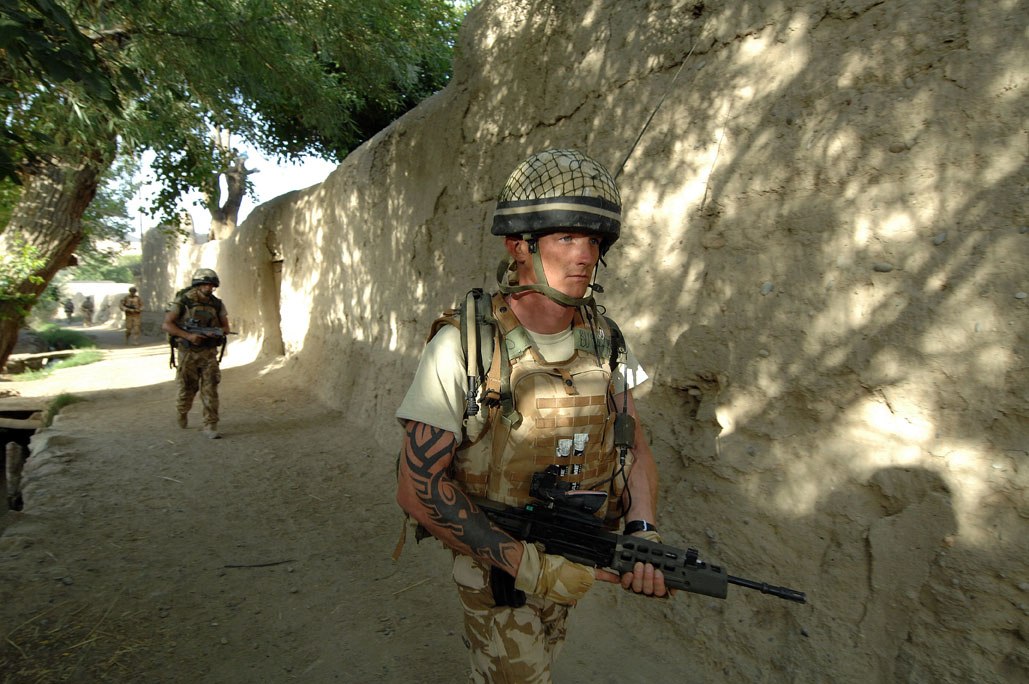 Figure 6 — A soldier of 2nd Battalion, The Parachute Regiment, at Kajaki, Afghanistan, in 2008, carrying an L85A2 with rail fore-end and optical sight. ISAF photograph by Staff Sgt. Jeffrey Duran, US Army, pu…