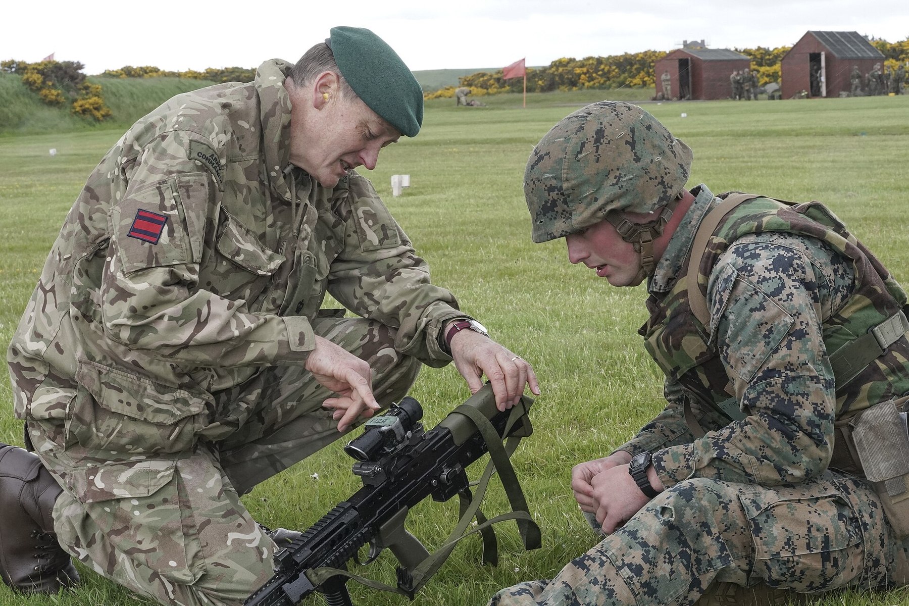 Figure 6 — A British Royal Marines instructor and a US Marine with an SA80 during battle-sight zeroing on Exercise Red Dagger. US Marine Corps photograph by Staff Sgt. Anthony Kirby, public domain.