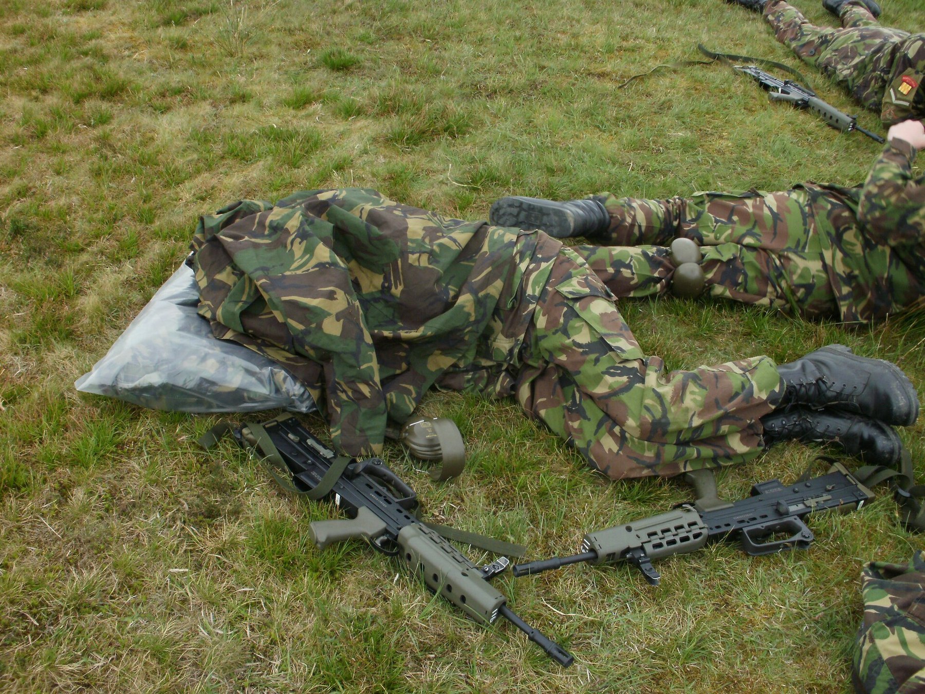 Figure 12 — Army cadets of Northumbria ACF on the range at Strensall during Brigade Skill at Arms Meeting 2010, firing cadet SA80s from the prone position. Photograph by Darryl Stark, CC BY-SA 2.0, via Wikimed…