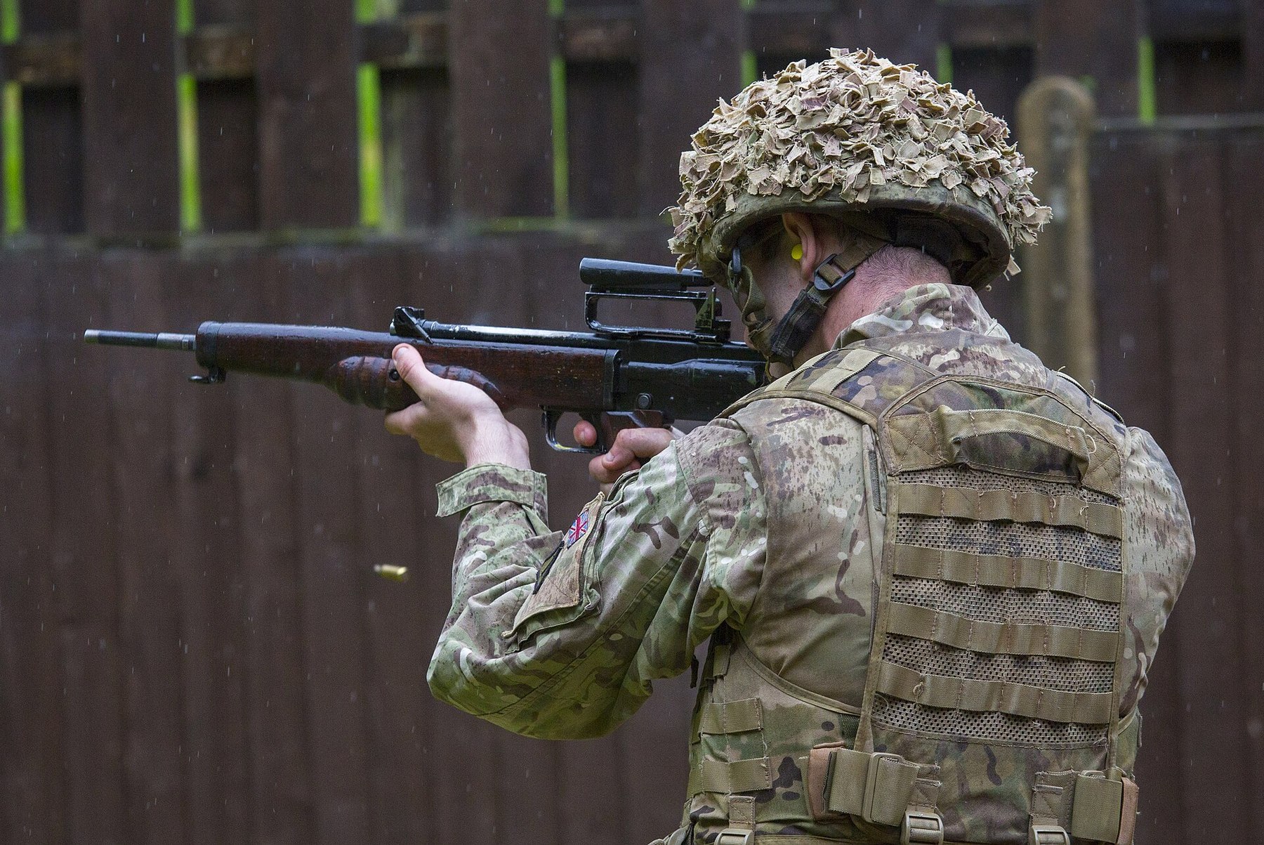Figure 3 — A British serviceman fires an EM-2 at a range in 2016, at a Ministry of Defence event at which the EM-2, an XL60-series prototype and an SA80-A2 were fired side by side. Photograph by PO Phot Owen …