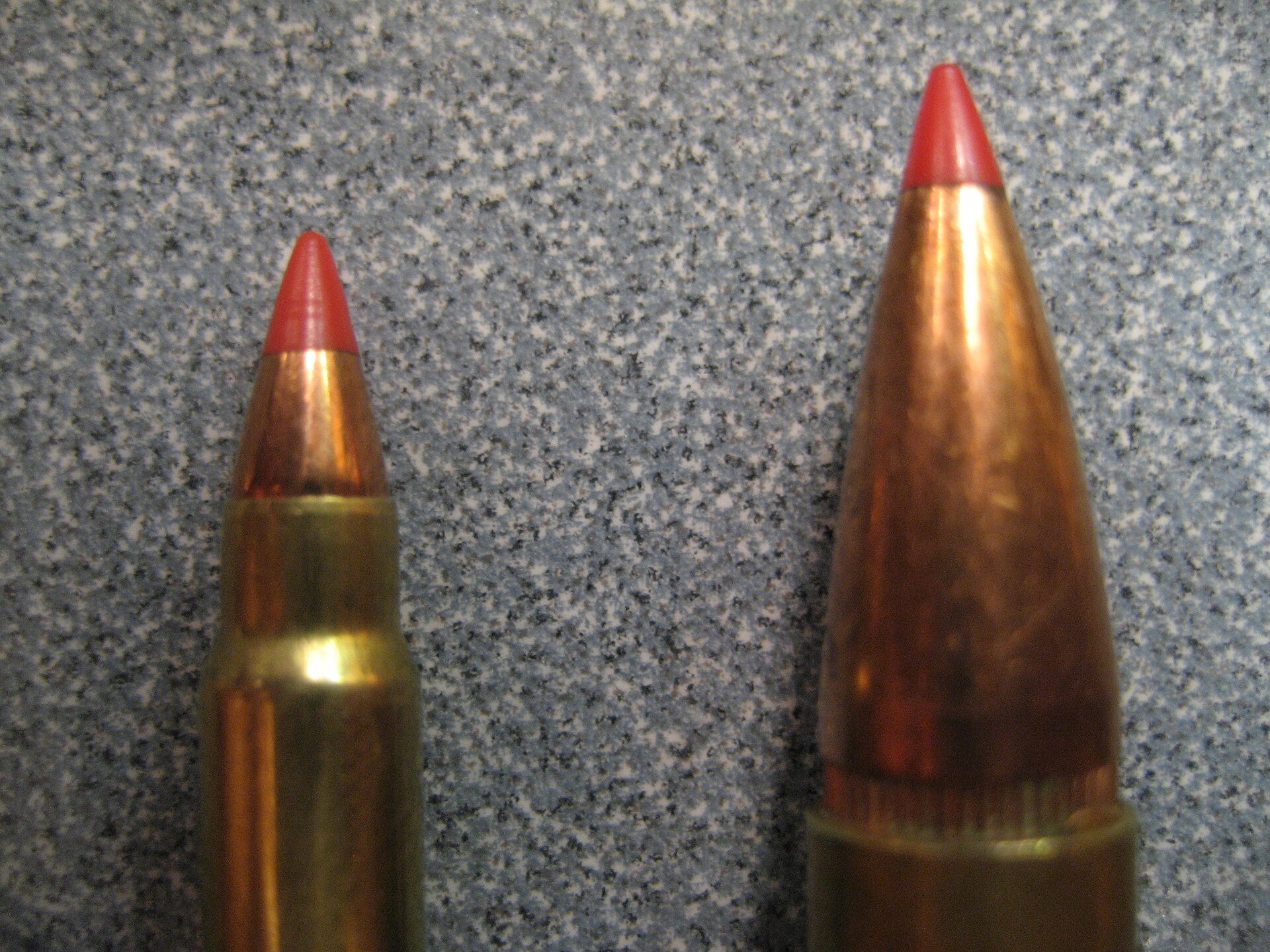 Figure 6 — A Hornady 17-grain V-MAX in a .17 HMR case, left, beside a 165-grain Hornady SST in .308 Winchester. Both are polymer-tipped bullets; the tip's job in each is the same, to start expansion on contac…