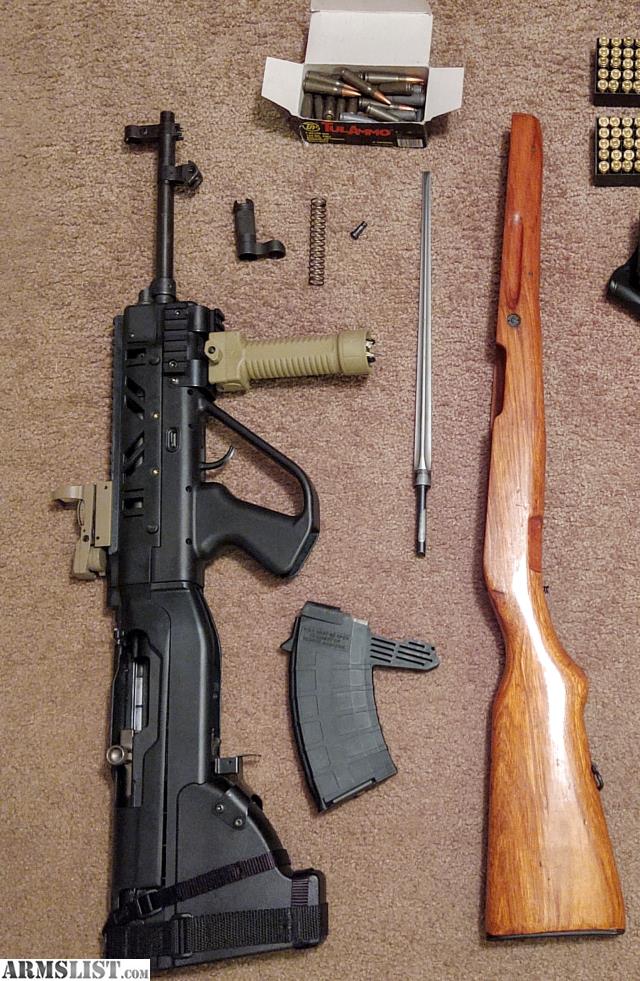 Figure 8 — A bullpup conversion kit with the original wood stock beside it. Keep the wood.