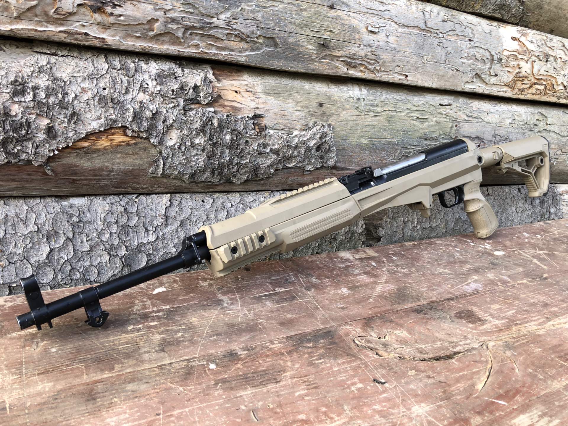 Figure 7 — The same chassis on a rifle. Once the SKS is in one of these, everything on it is an AR accessory.