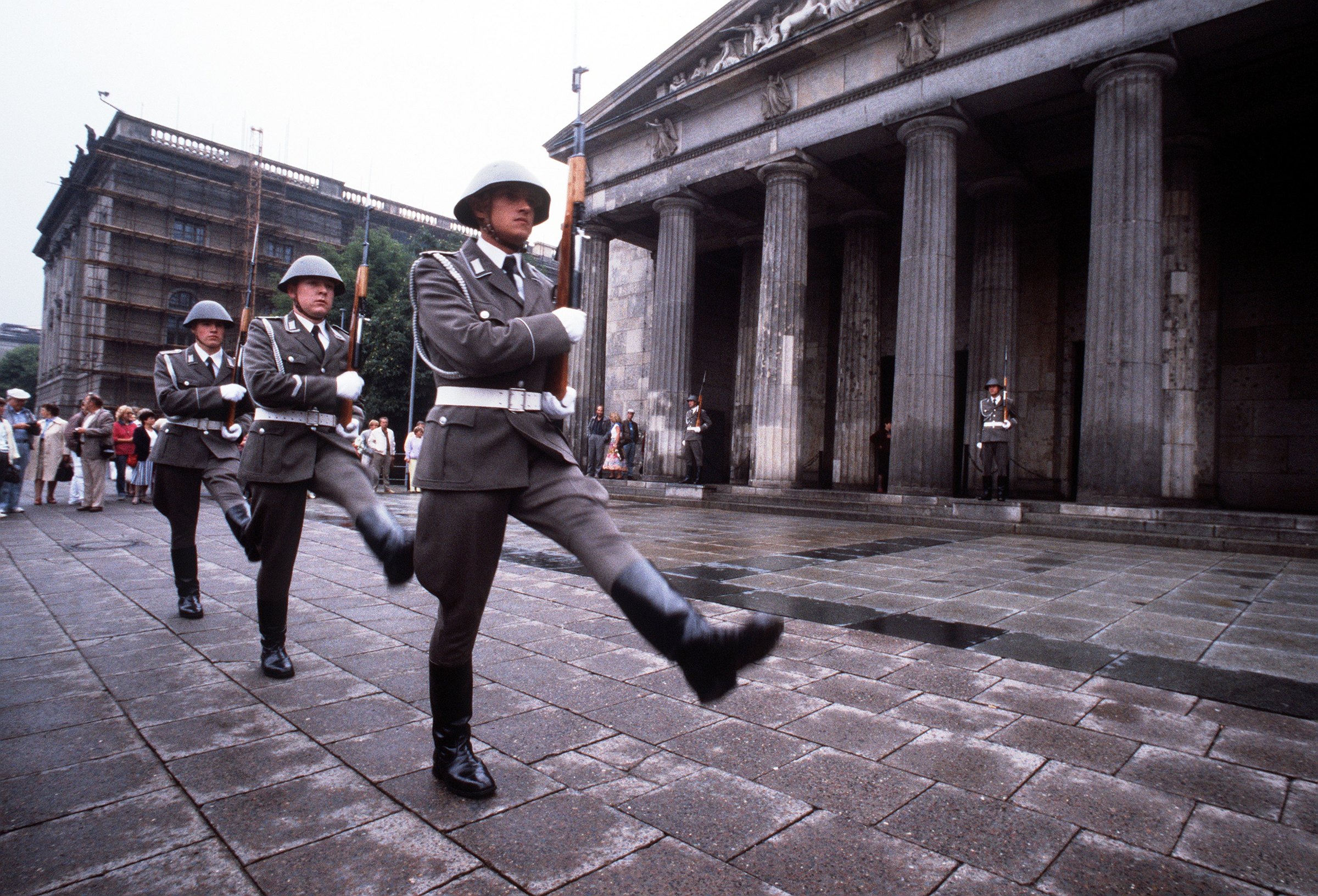 Figure 8 — Changing of the guard in East Berlin. The stock slot for the pull-through sling is the identifying feature, though not one you can see at parade distance.
