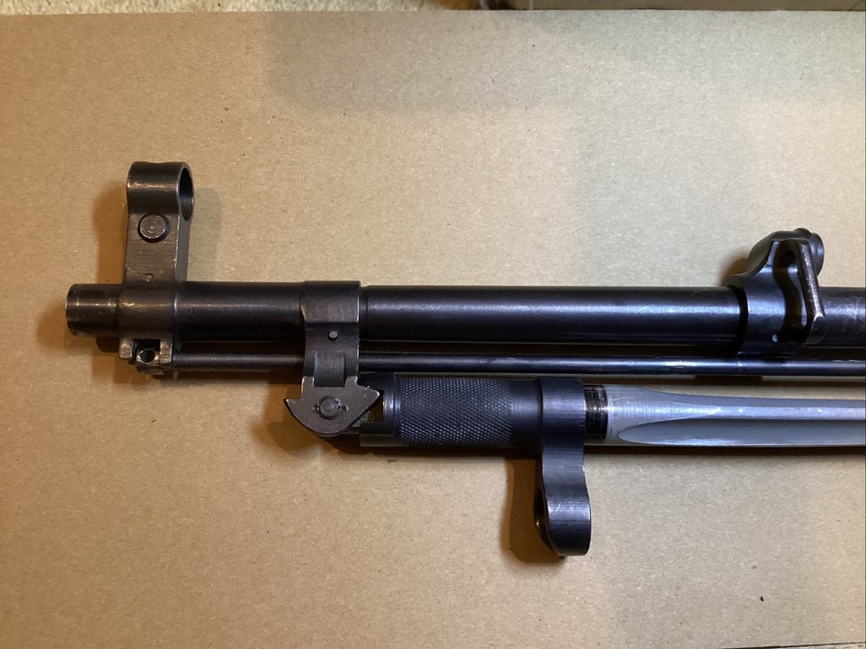 Figure 3 — The gas block in close-up. The port through the barrel wall is under the block, and the piston sits in line with the bore behind it.