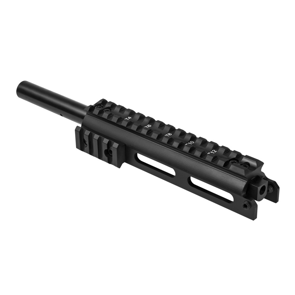Figure 2 — A gas-tube rail mount. The sight channel down the middle is the feature to look for — without it you lose the irons.