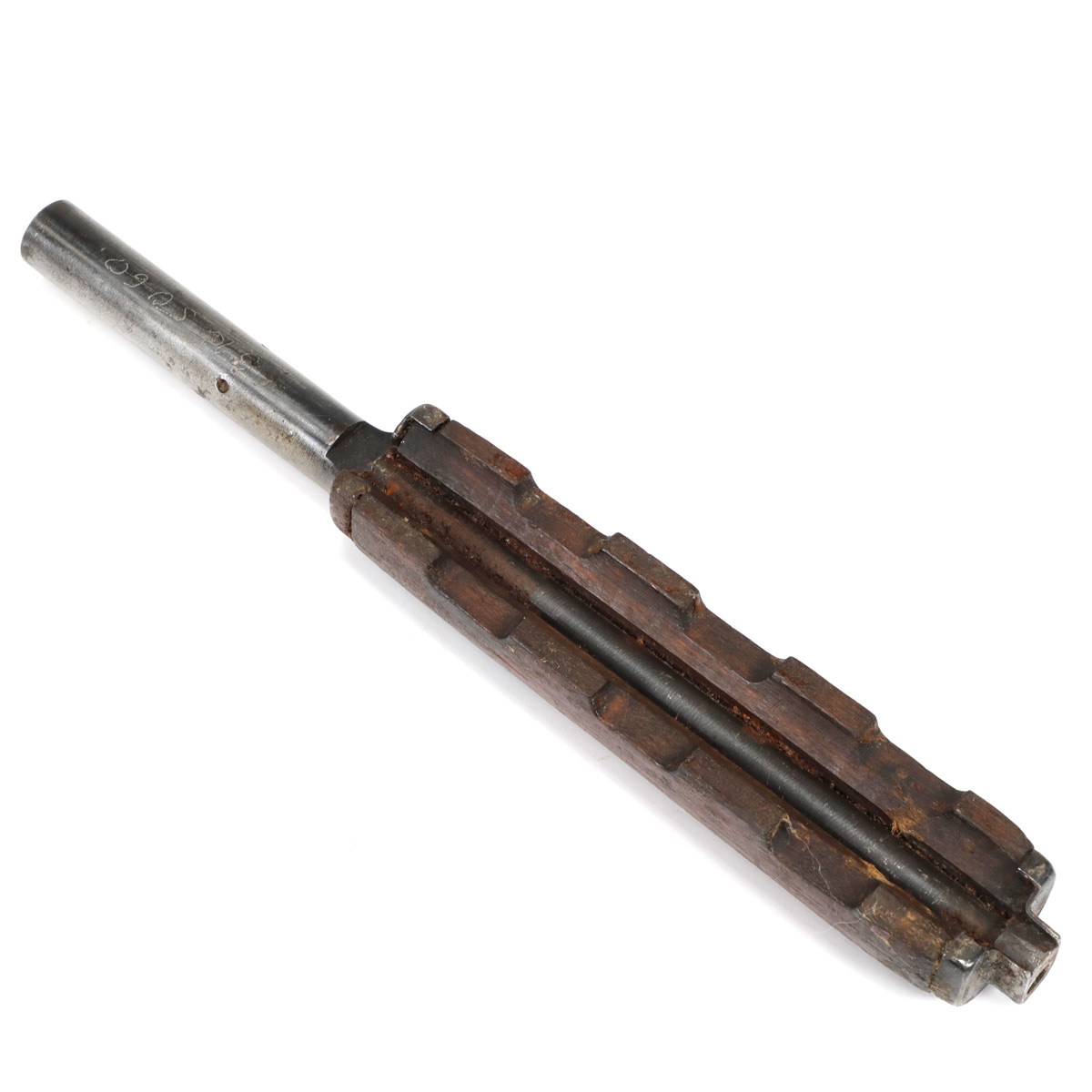 Figure 5 — The gas tube with its wooden upper handguard, off the rifle. This example has a cracked handguard, which is extremely common — the wood is thin and it takes the heat.