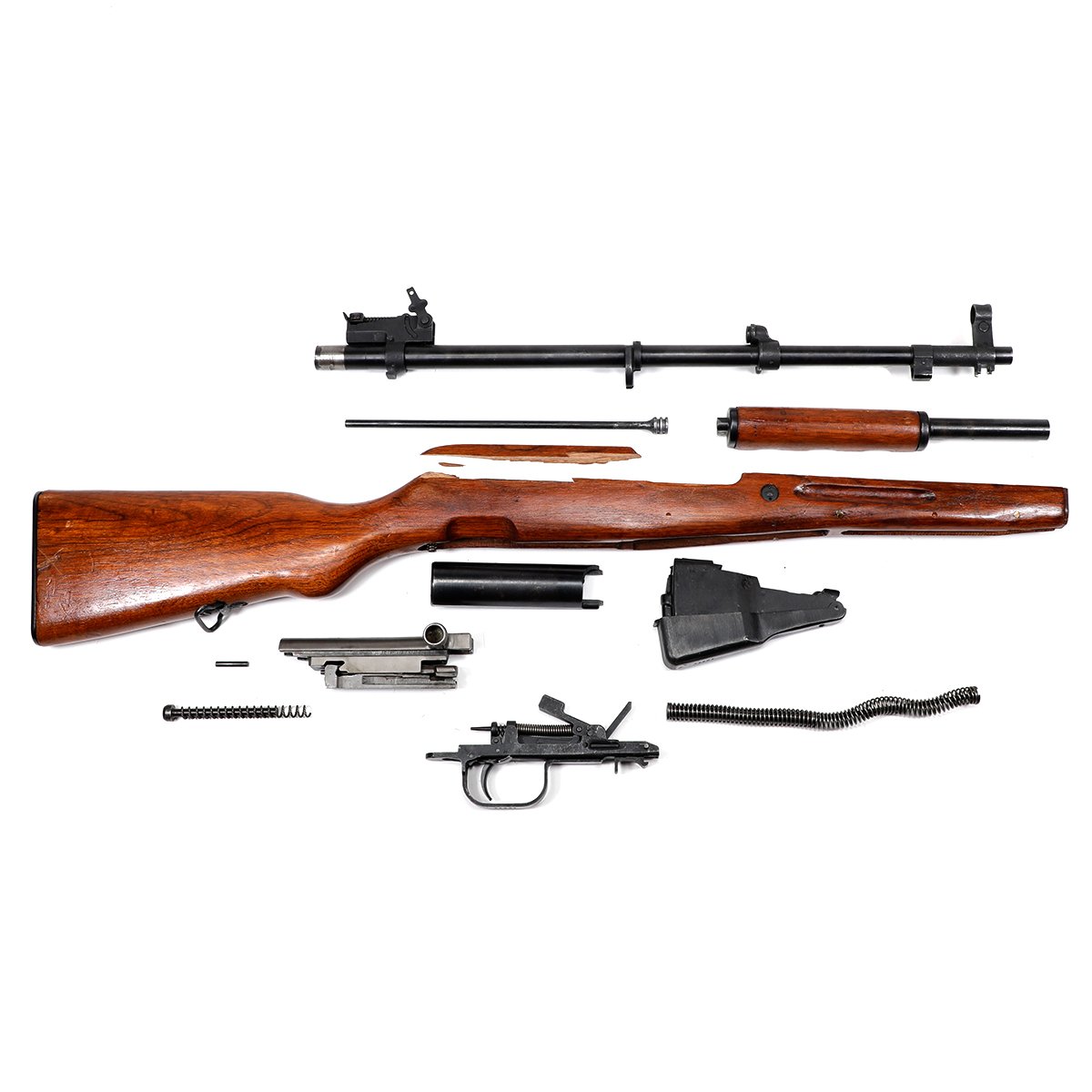 Figure 1 — A complete SKS parts kit laid out — every part of the rifle short of the receiver. If you want to know what is inside the six groups you produced in Vol 10, this is the answer in one photograph.