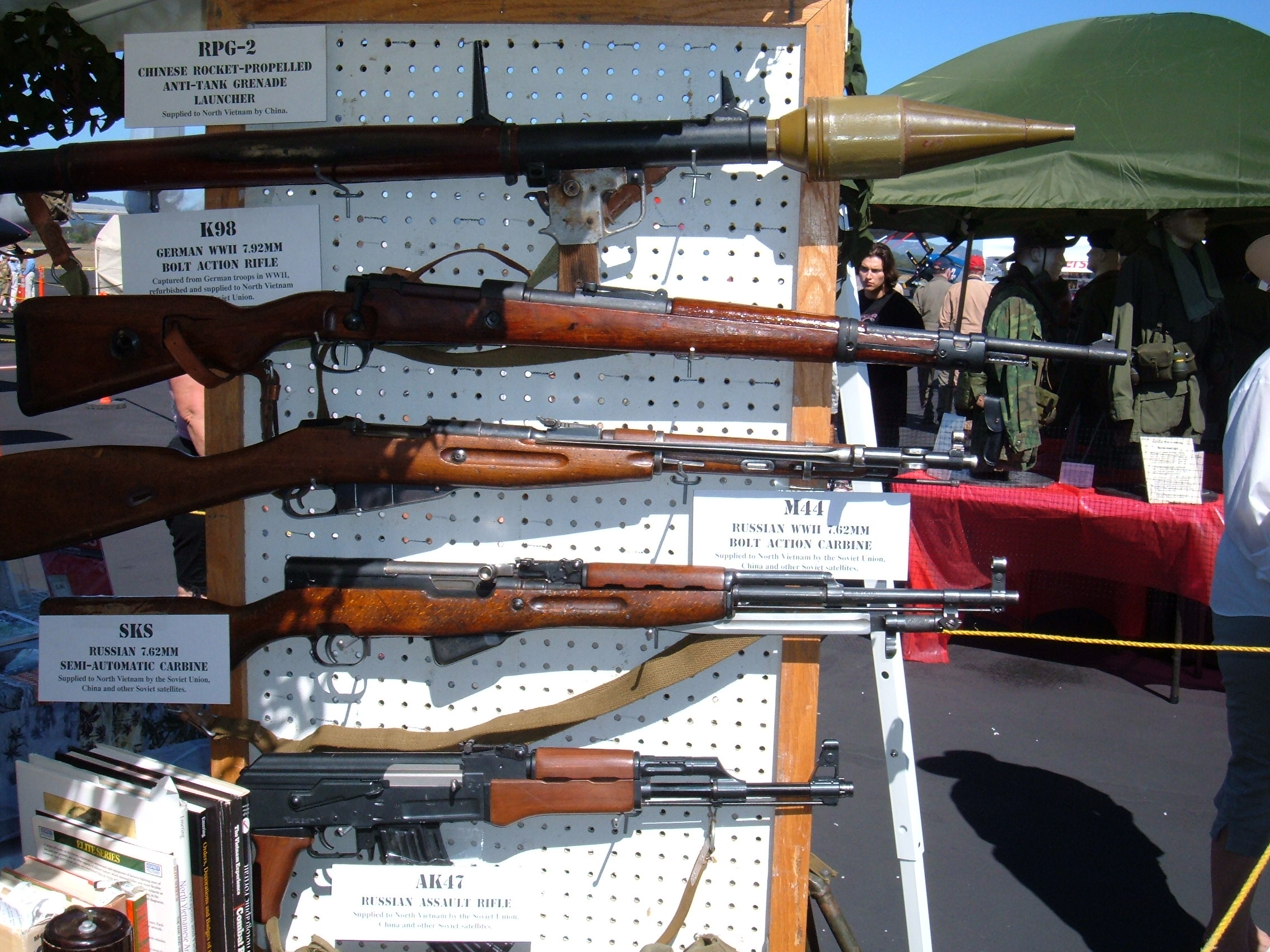 Figure 9 — Captured weapons on a US display board. Bring-backs like these were the entire American SKS supply until the late 1980s.