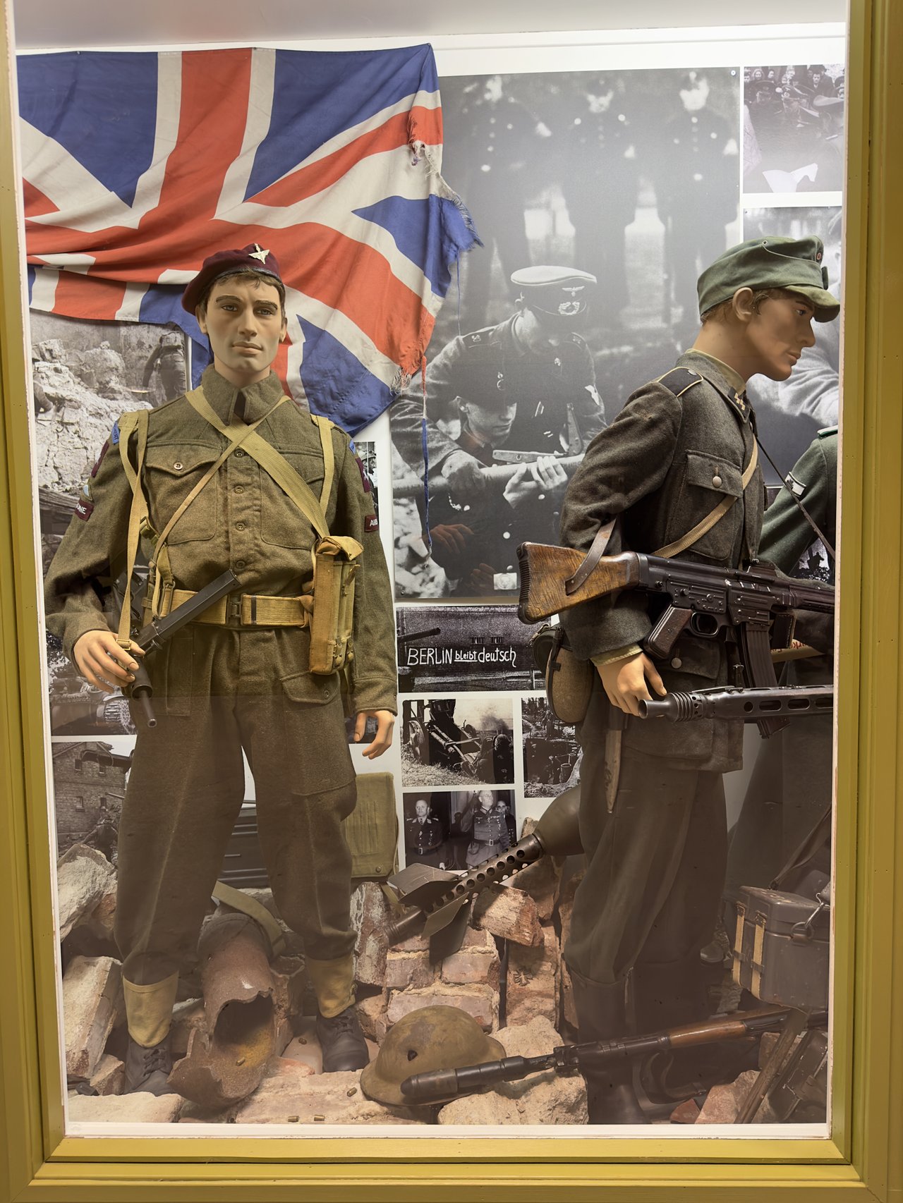 Figure 2 — 5 — A British paratrooper battle-dress display at the Arquebus Krigshistorisk Museum, Norway, showing the Mk V STEN as the airborne soldier's standard weapon. The Mk V furniture is fully v…