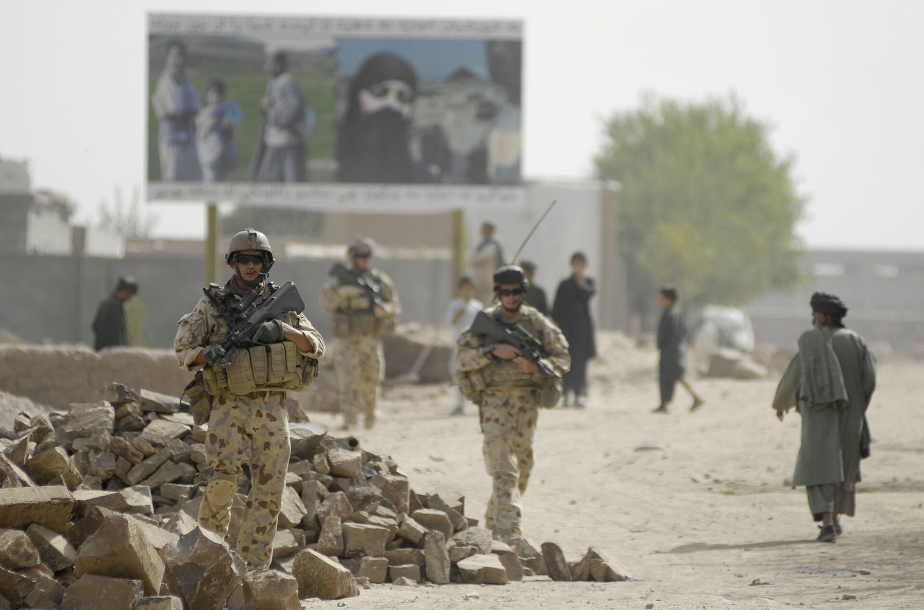 Figure 9 — A 3 RAR foot patrol in Tarin Kowt in August 2008. Photograph: Petty Officer 1st Class John Collins, US Navy, public domain.