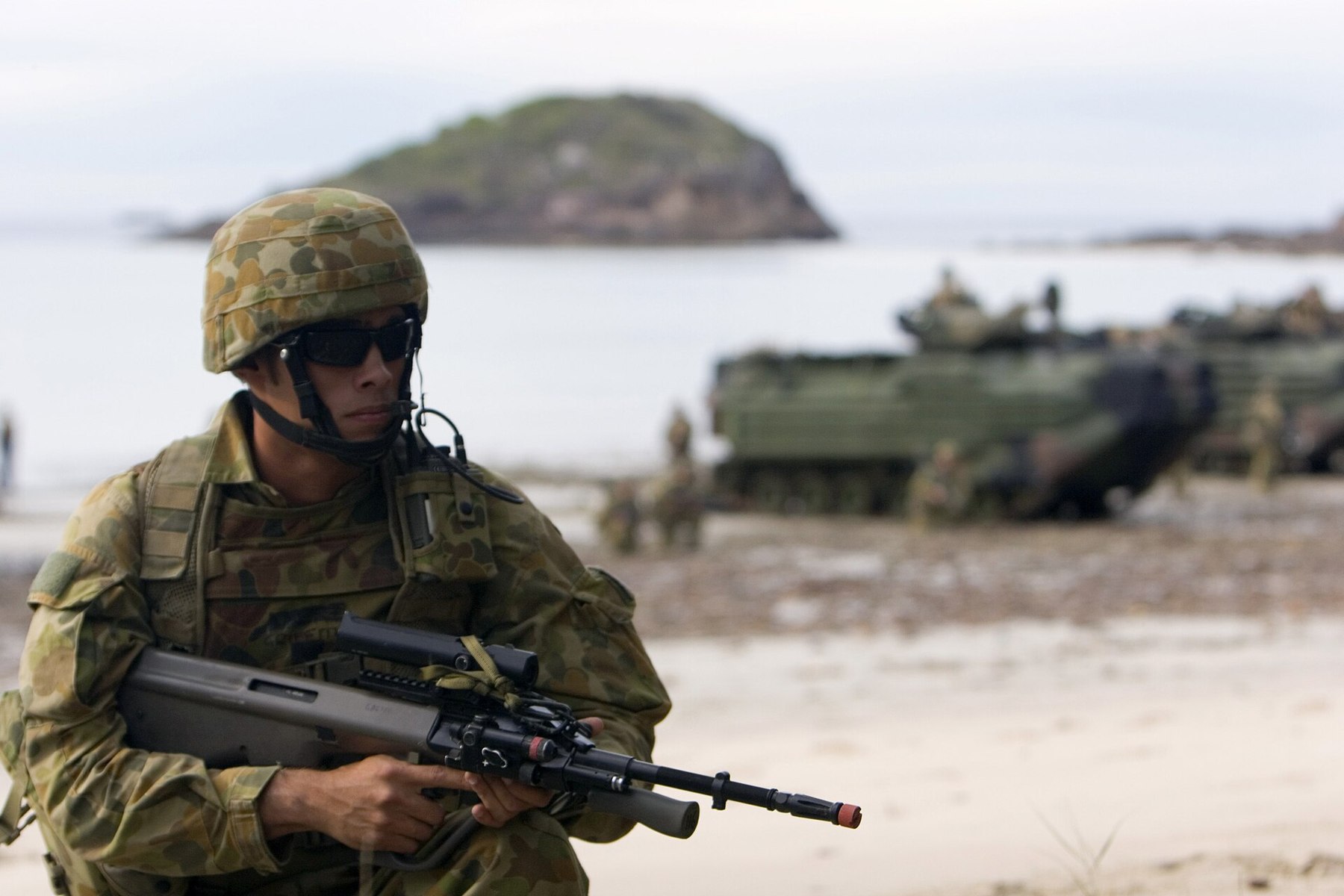 Figure 7 — An F88 with its integral optic, carried by a soldier of 2nd Battalion, Royal Australian Regiment, during an amphibious exercise at Shoalwater Bay in 2007. Photograph: Cpl. Kamran Sadaghiani, US Mar…