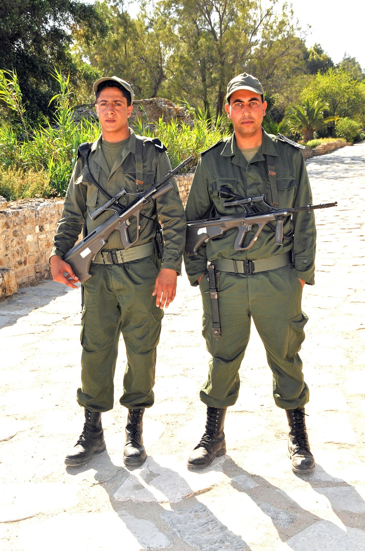 Figure 1 — Tunisian soldiers with AUGs near the Antonine Baths at Carthage in 2012. Tunisia's 1978 delivery is the earliest export in Watters's chronology. Photograph: Dennis G. Jarvis, CC BY-SA 2.0.
