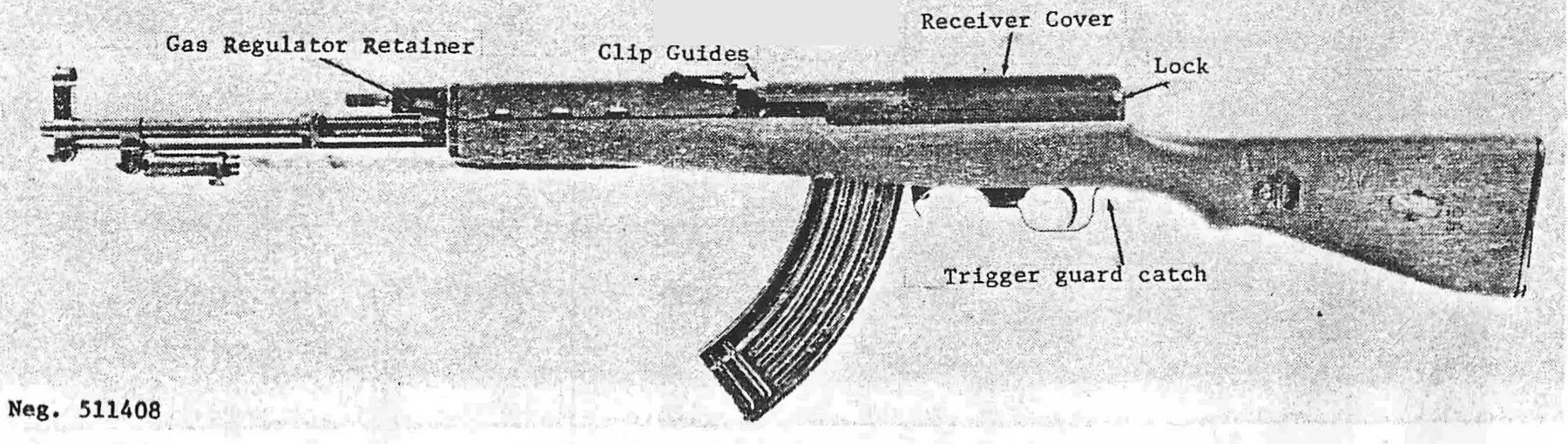 Figure 4 — The left side of the rifle, as the DIA labelled it: the gas regulator retainer at the front of the gas cylinder; the clip guides on the carrier; the receiver cover and the lock at its rear; and the…