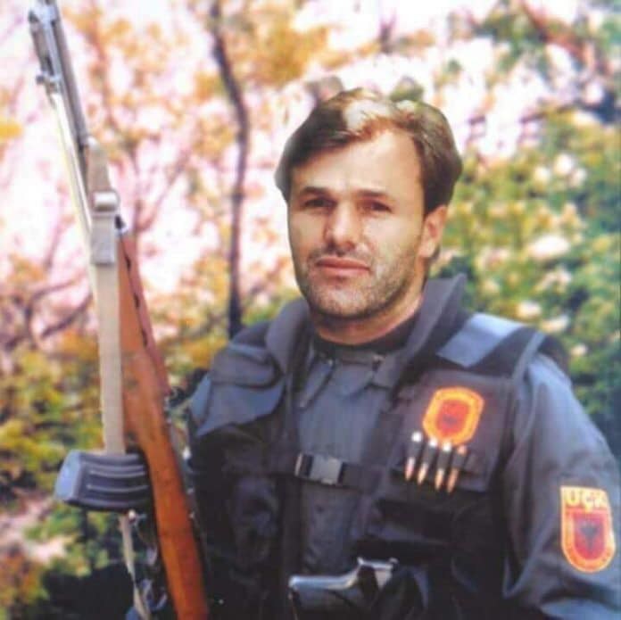 Figure 7 — A Kosovo Liberation Army fighter in the late 1990s with an SKS-pattern rifle fitted with a detachable curved magazine and a folding spike bayonet, the Type 63's combination; the rifle is only partl…