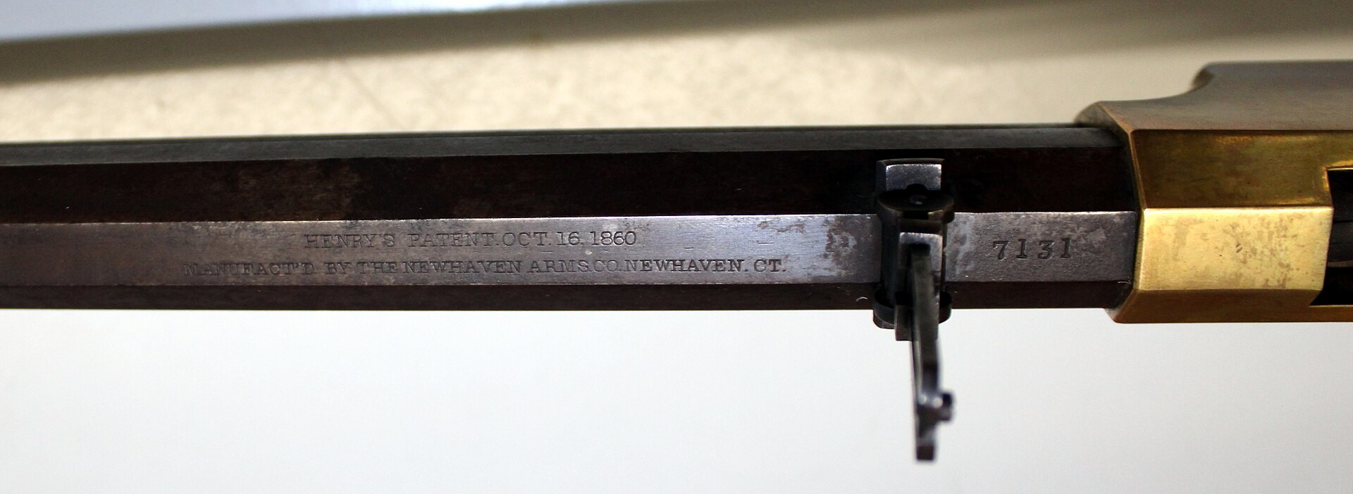 Figure 13 — The barrel legend of a Henry rifle in the Wehrtechnische Studiensammlung, Koblenz: "HENRY'S PATENT. OCT. 16. 1860" over "MANUFACT'D BY THE NEWHAVEN ARMS CO. NEWHAVEN. CT". Unlike the company's Volc…