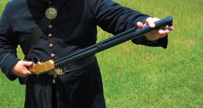 Figure 10 — Step 2: the front section of the magazine is turned aside to open the tube. Public domain, NPS.