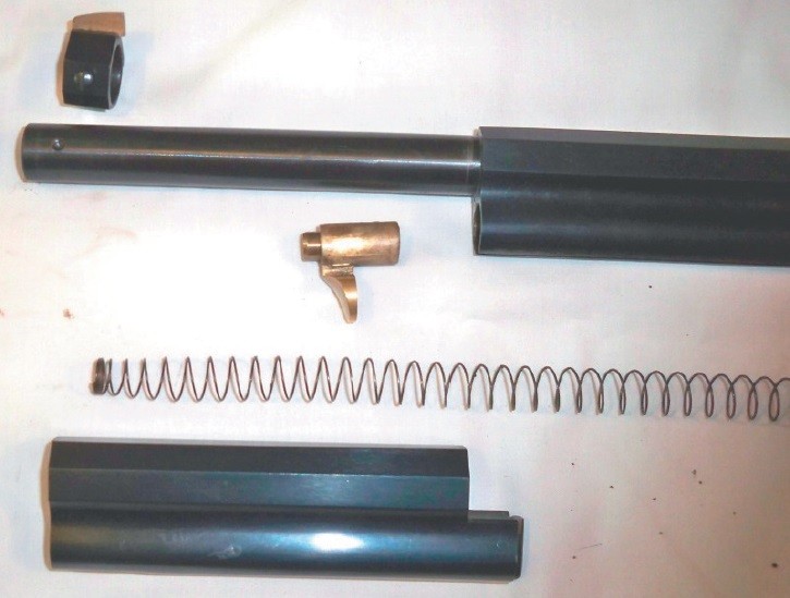 Figure 5 — The Henry rifle's magazine parts, from the National Park Service manual: the barrel and tube, the follower, the spring and the turning front section. The Volcanic's magazine works the same way, at …