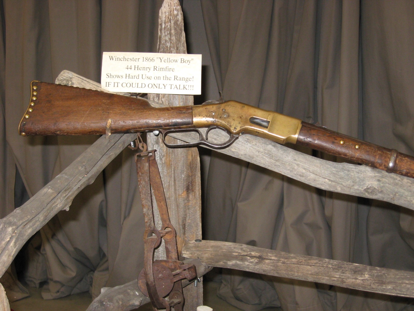 Figure 19 — A Winchester Model 1866 rifle, the "Yellow Boy" of its brass frame, in .44 Henry rimfire, photographed at a gun show. Photograph by Trekphiler, CC BY 3.0.