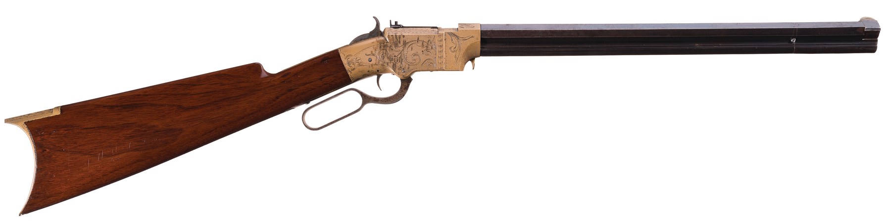 Figure 9 — A factory-engraved New Haven Arms Company Volcanic carbine, 16.5-inch octagon barrel, right side. The brass frame without a side loading gate, the lever loop and the magazine tube under the barrel …