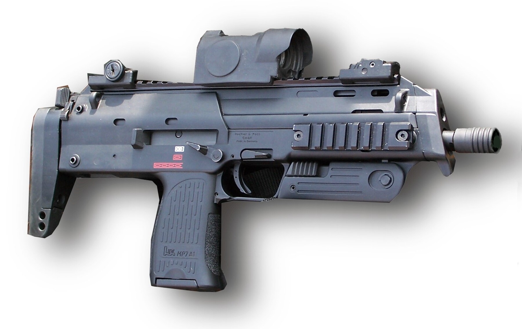 Figure 1 — An MP7A1, photographed in Germany in 2008, with a Hensoldt-pattern reflex sight, the issued sight, on the top rail between the raised iron sights.