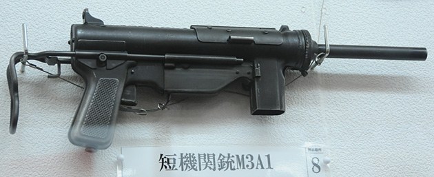 Figure 2 — An M3A1 submachine gun, the US "grease gun" that the Ground Self-Defense Force used for decades, displayed at the Camp Itazuma museum. Photograph by Argonaut, from Spear Head No. 13 (2012), as repr…