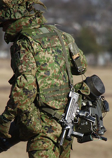 Figure 6 — An M9 carried slung at the side by a Ground Self-Defense Force soldier. Photograph by Argonaut, from Spear Head No. 13 (2012), as reproduced by Hyper Douraku.