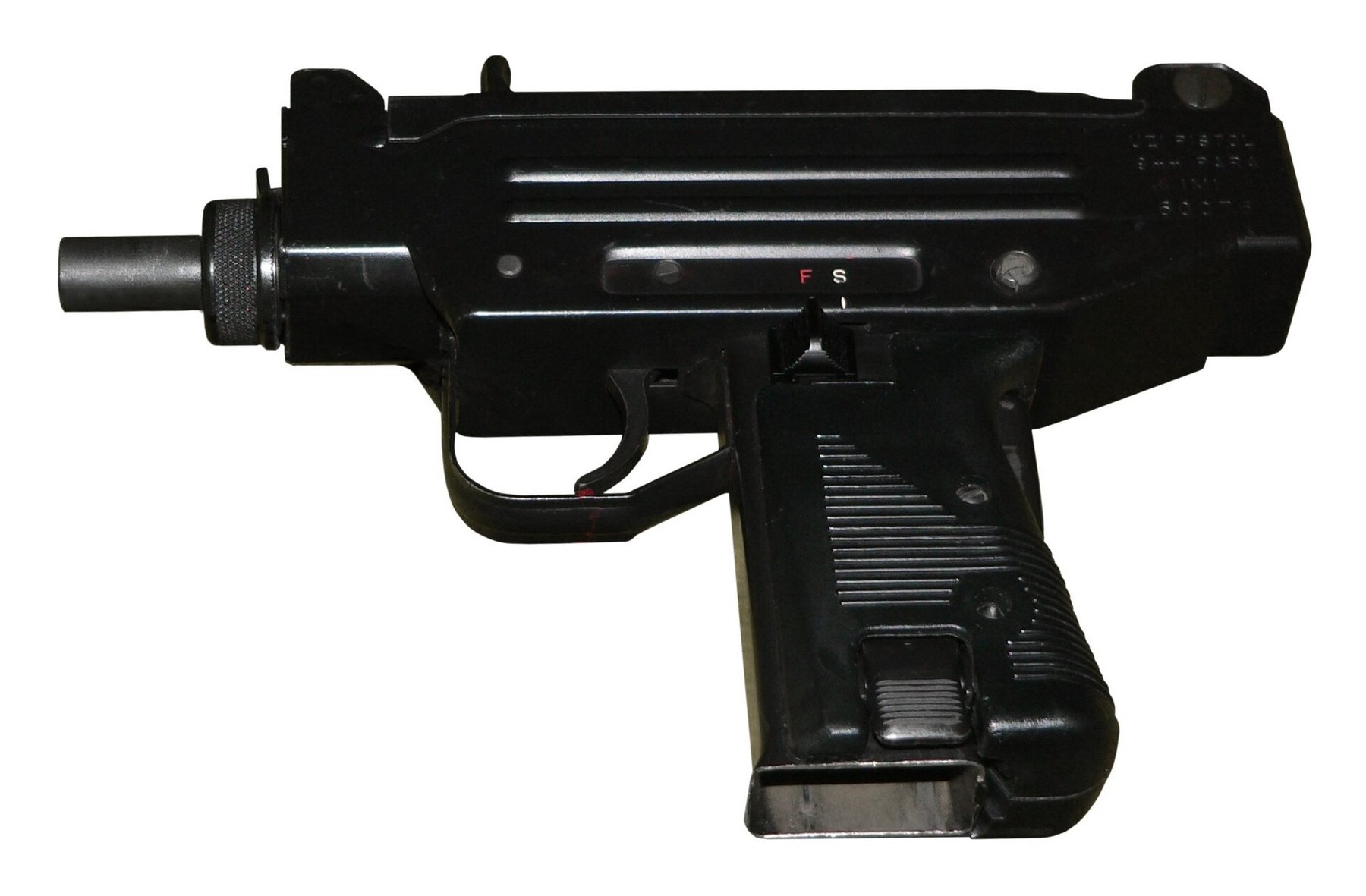 Figure 4 — A semi-automatic UZI PISTOL, left side, its receiver marked UZI PISTOL 9mm PARA and its selector marked only F and S. The photographer described it as a micro uzi; the markings identify the semi-au…
