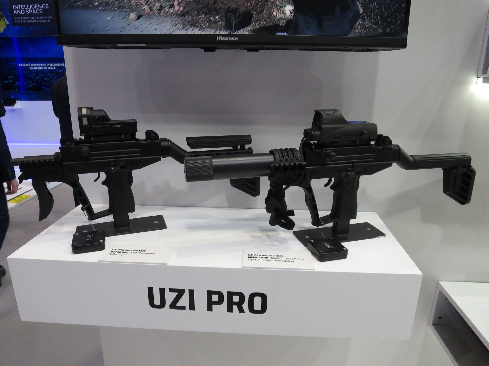 Figure 3 — Two UZI PRO weapons at the IDEX defence exhibition, 2023: the current form of the Uzi family, with top rails, side charging handles and optics. Photograph by Mztourist, CC BY-SA 4.0, via Wikimedia …