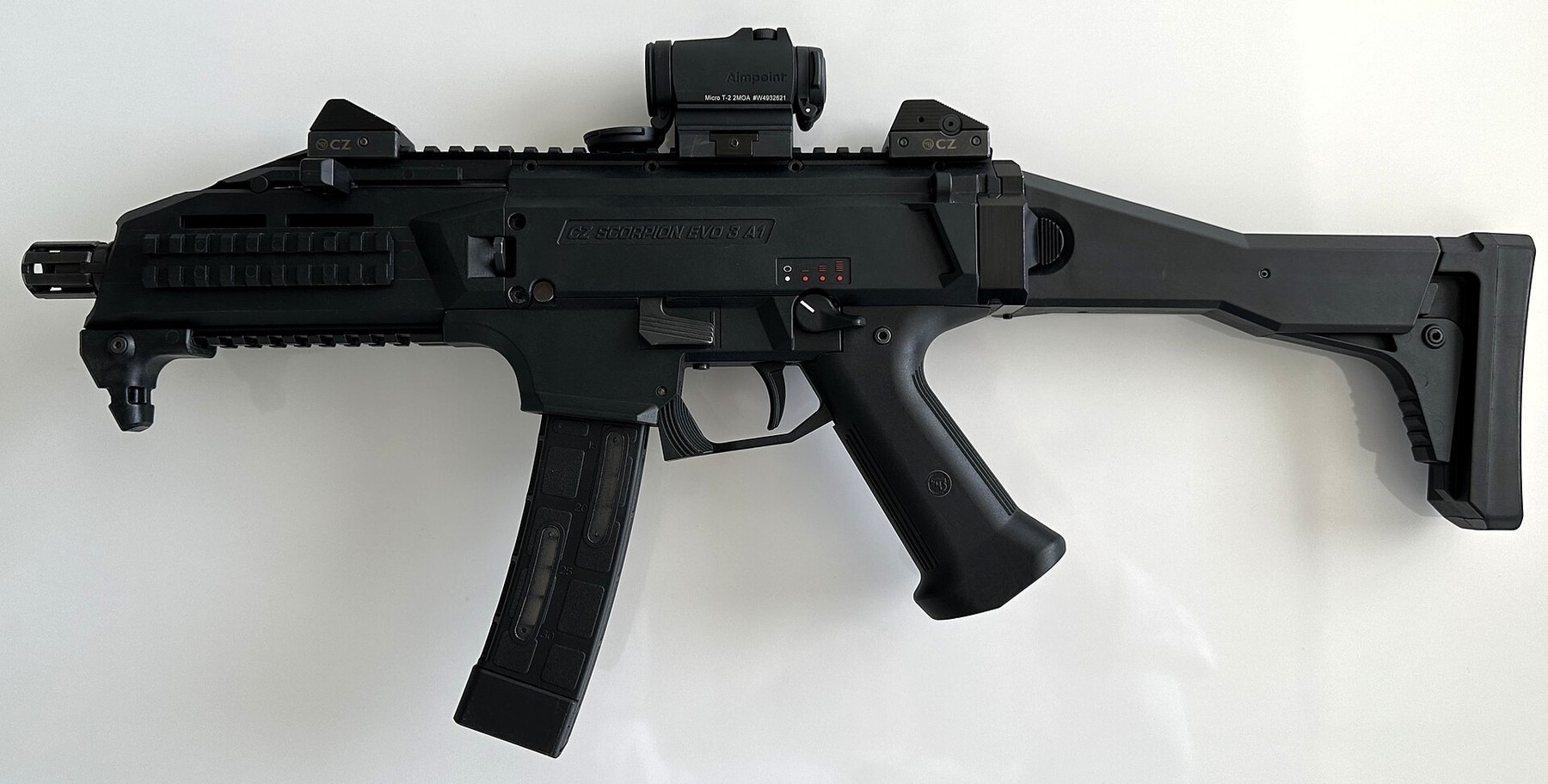 Figure 10 — A CZ Scorpion EVO 3 A1, left side, with a red-dot sight: a different design that shares only the name. Photograph by Land68, CC0, via Wikimedia Commons.