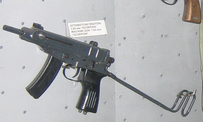 Figure 2 — A Škorpion, stock unfolded, plastic grip, in the Belgrade Military Museum's display of 72nd Special Brigade equipment from 1999, labelled "automatic pistol 7.65 mm Scorpion". Crop of a photograph b…